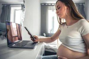 Digital pregnancy test showing a positive result