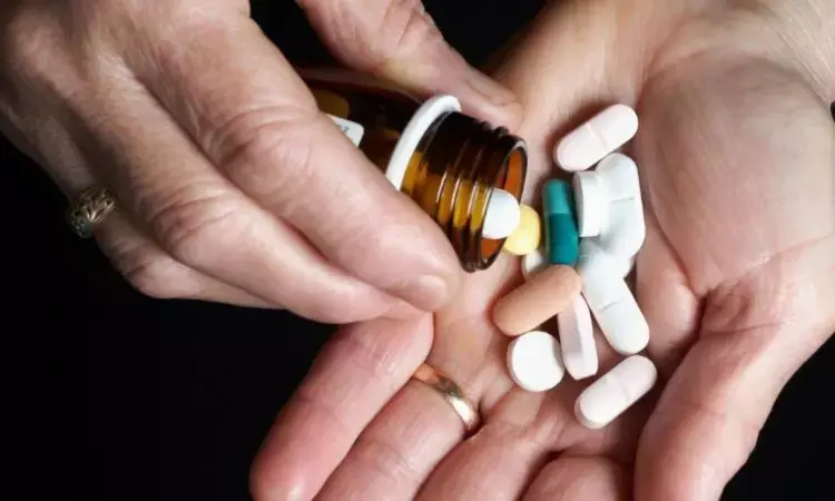 Enclomiphene tablets in a white prescription bottle labeled for hormonal therapy